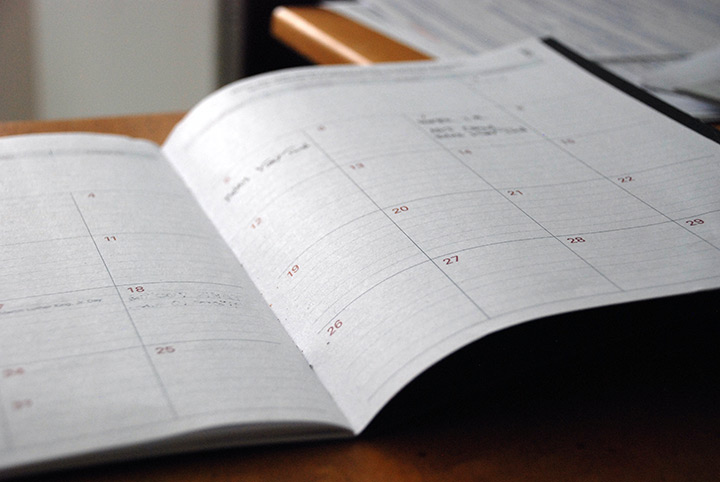 A calendar spread open in a notebook