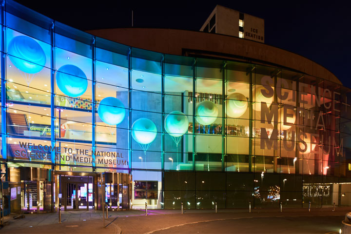 A night photo of the front of Bradford National Science and Media Museum