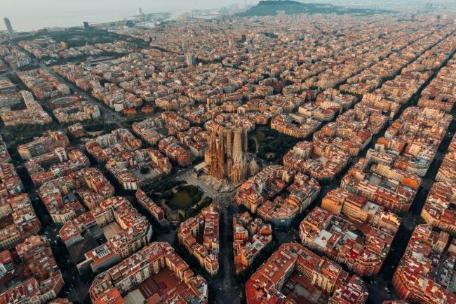 Aerial view of Barcelona, Spain cityscape with iconic landmarks.