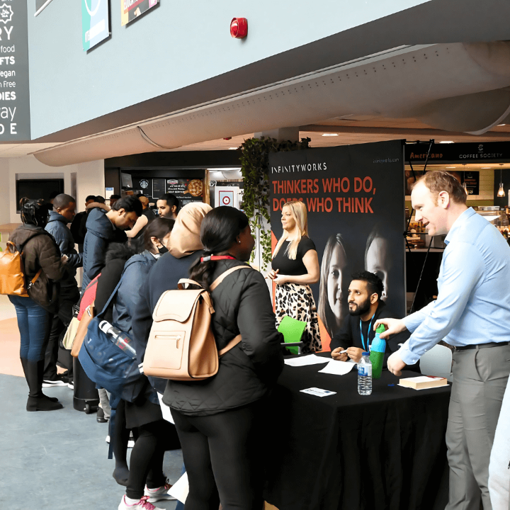 An image of students and employer at last years careers fair