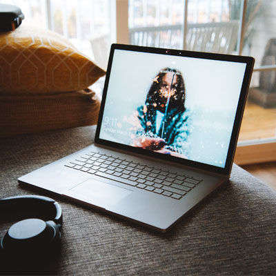 A laptop with a video playing on the screen.