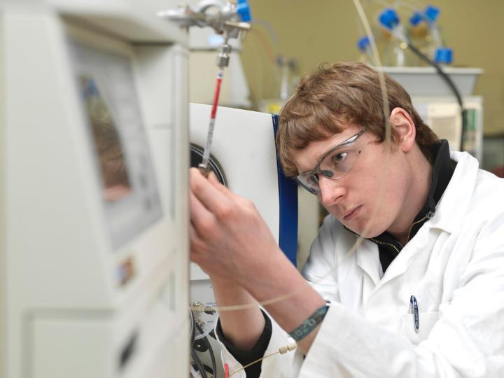 A student using the Mass Spectrometer