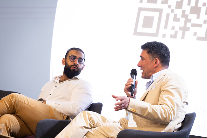 Kamran Mahroof and Paul Thorning in discussion at the MBA Summit.
