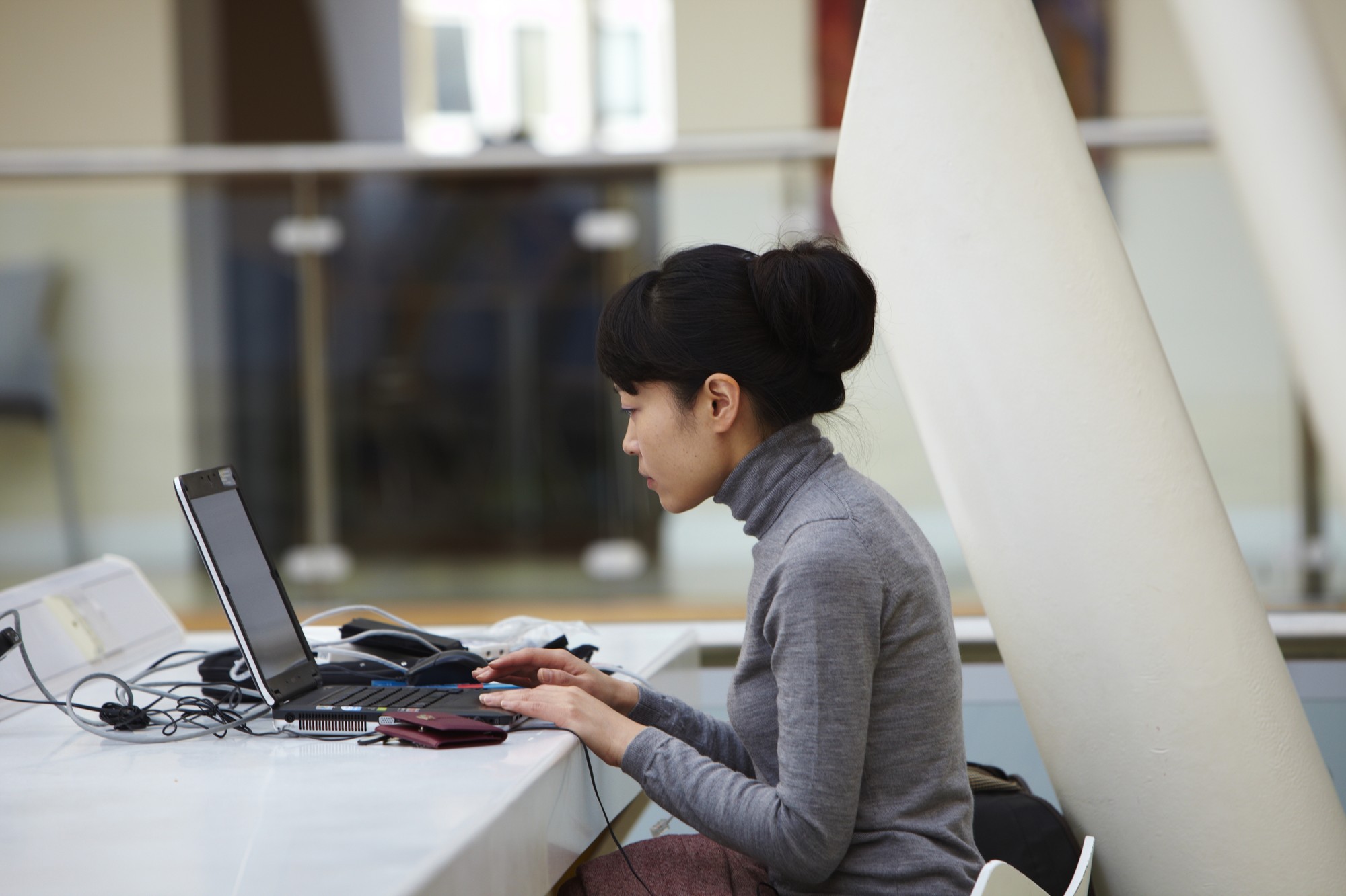 An image of a student using their laptop