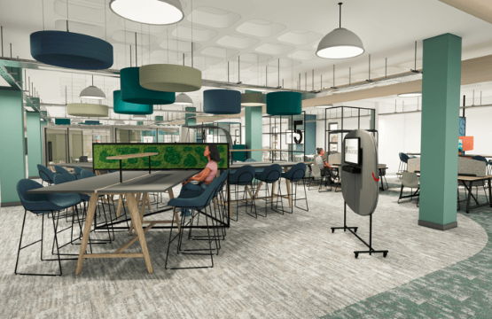 Image of new library area with grey flooring, modern desks and lighting