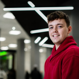 Joe, an undergraduate student in Management and Business Analytics in the Richmond building 